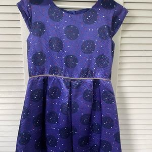 Girls fancy dress. Crinkle satin with polka dot pattern. Gold detail